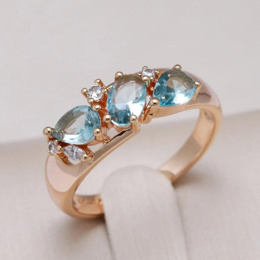 Elegant blue vintage ring with zirconia stones in a gold setting