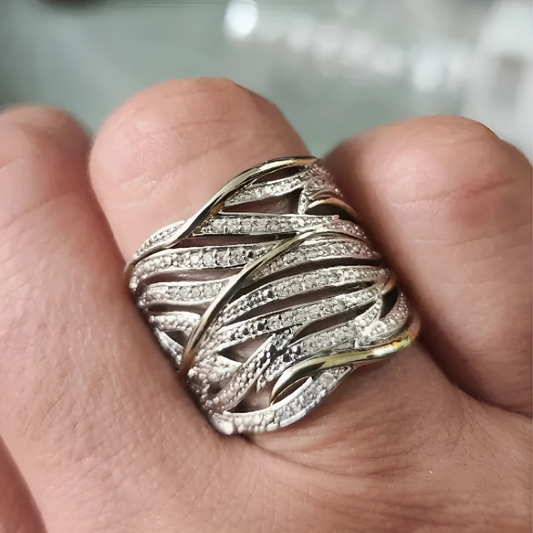 Elegant multilayered twisted ring